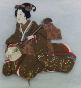 三味線をひく女